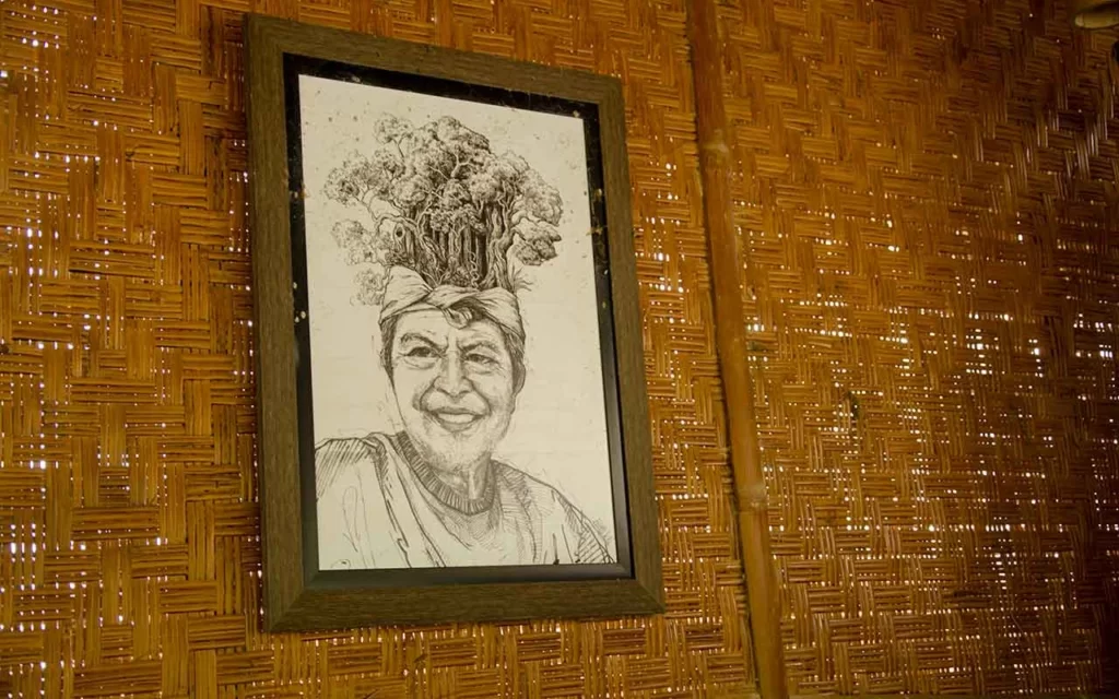 An artist is make an illustration of enviromental activist by modified Putu Ardana profile picture. Photo: pourmorecoffee.com