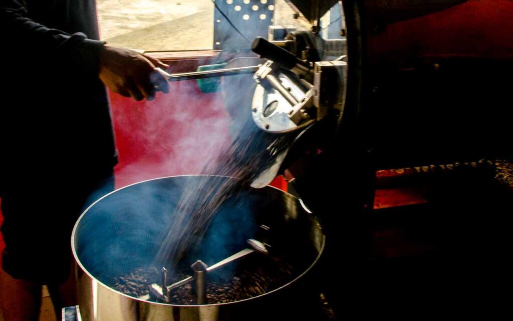 Roasted coffee beans cooling process. Photo: pourmorecoffee.com