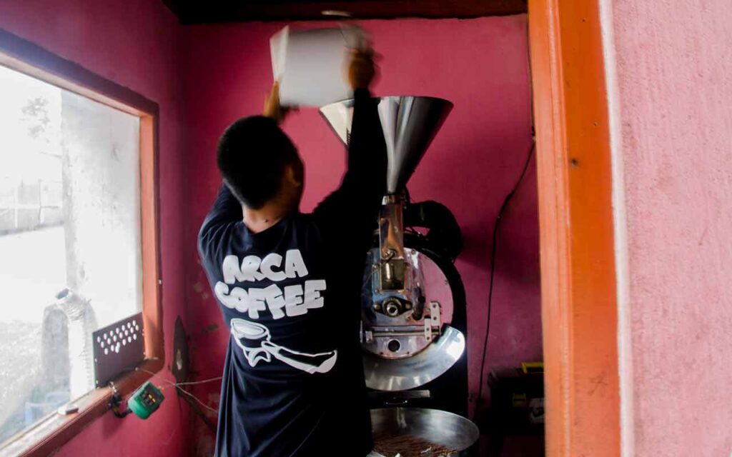 I Wayan Arca is roasting coffee beans in his factory. Photo: pourmorecoffee.com