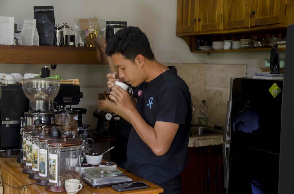 Arya Giri is sipping a cup of coffee taste the flavours. Photo: Pourmorecoffee.com
